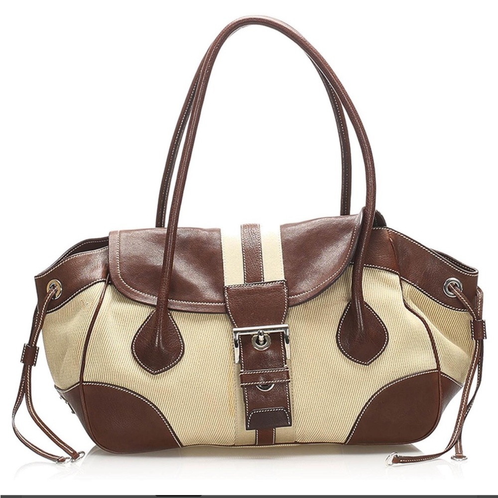 PRADA
Vitello Trimmed Shoulder Bag
Beige canvas & brown leather
